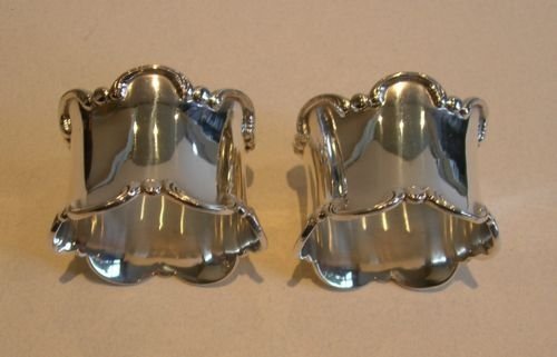 elegant pair antique english sterling silver napkin rings 1910