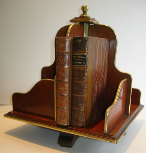 unusual french mahogany and brass revolving book caddy for desktop