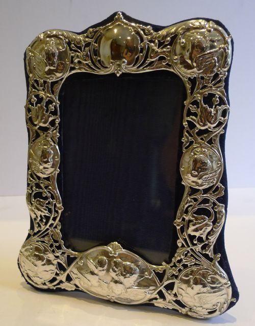 art nouveau sterling silver photo frame by william comyns reynold's angels winged cherubs