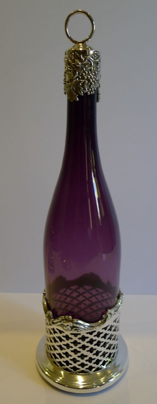 magnificent amethyst coloured crystal bottle decanter with sterling silver collar 1839