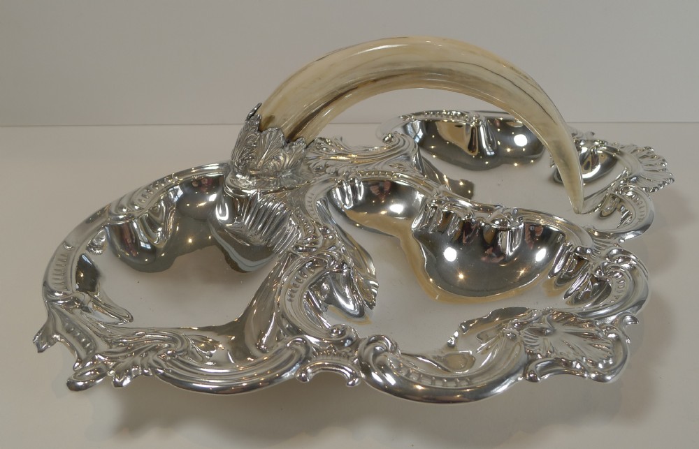 antique english silver plated cocktail dish with boar tusk handle c1900