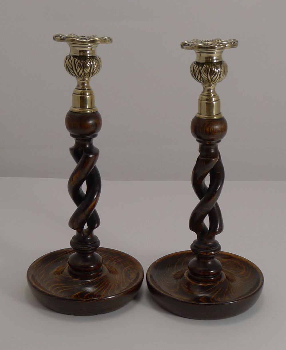 pair antique english 10 oak open barley twist candlesticks brass thistle tops