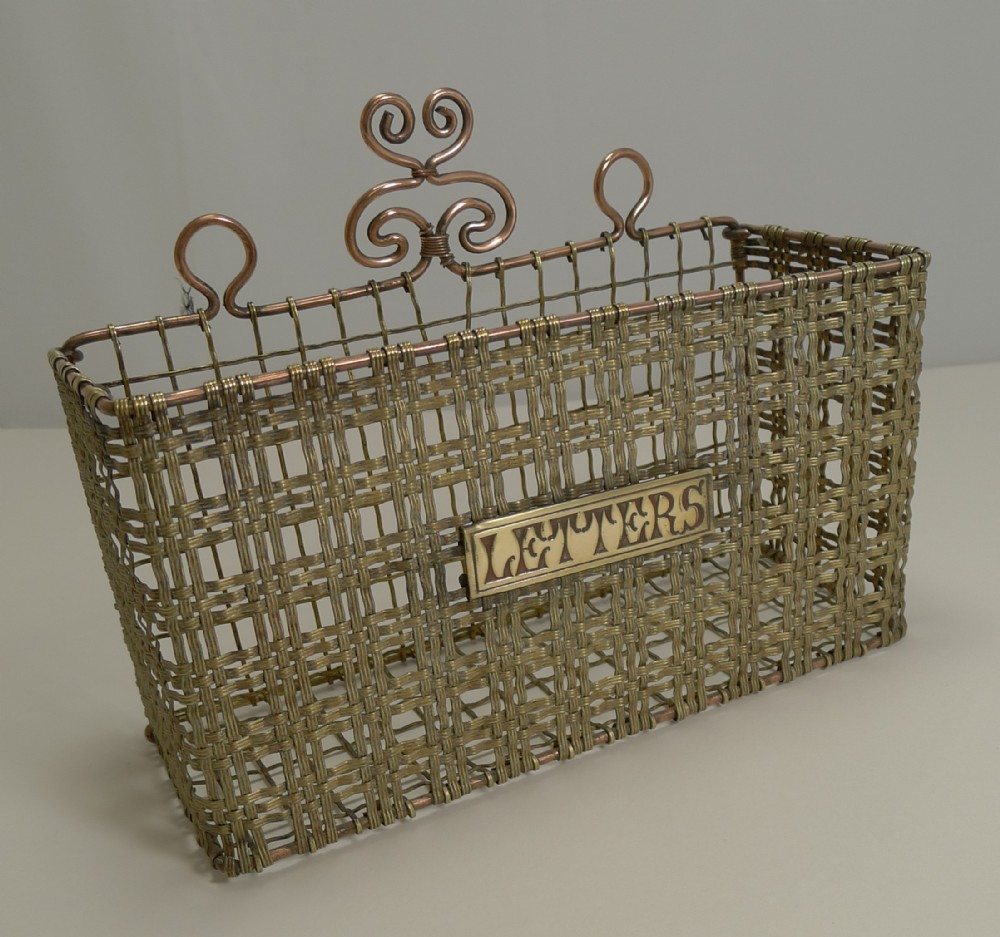 handsome antique english brass mesh letters caddy or holder c1880