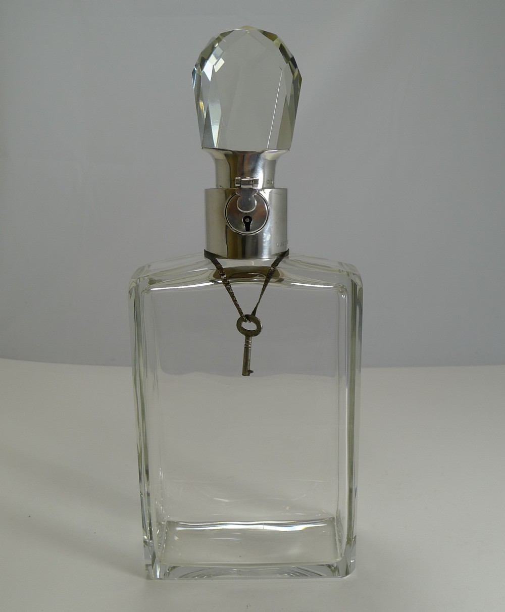 english art deco crystal and sterling silver locking decanter by hukin and heath