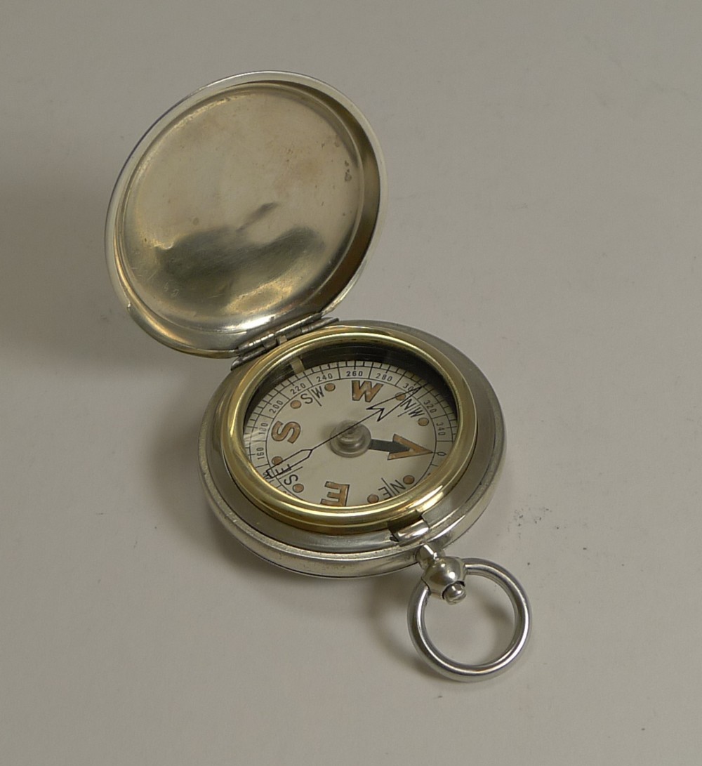 Lot 271 - A brass compass made by F Barker & son