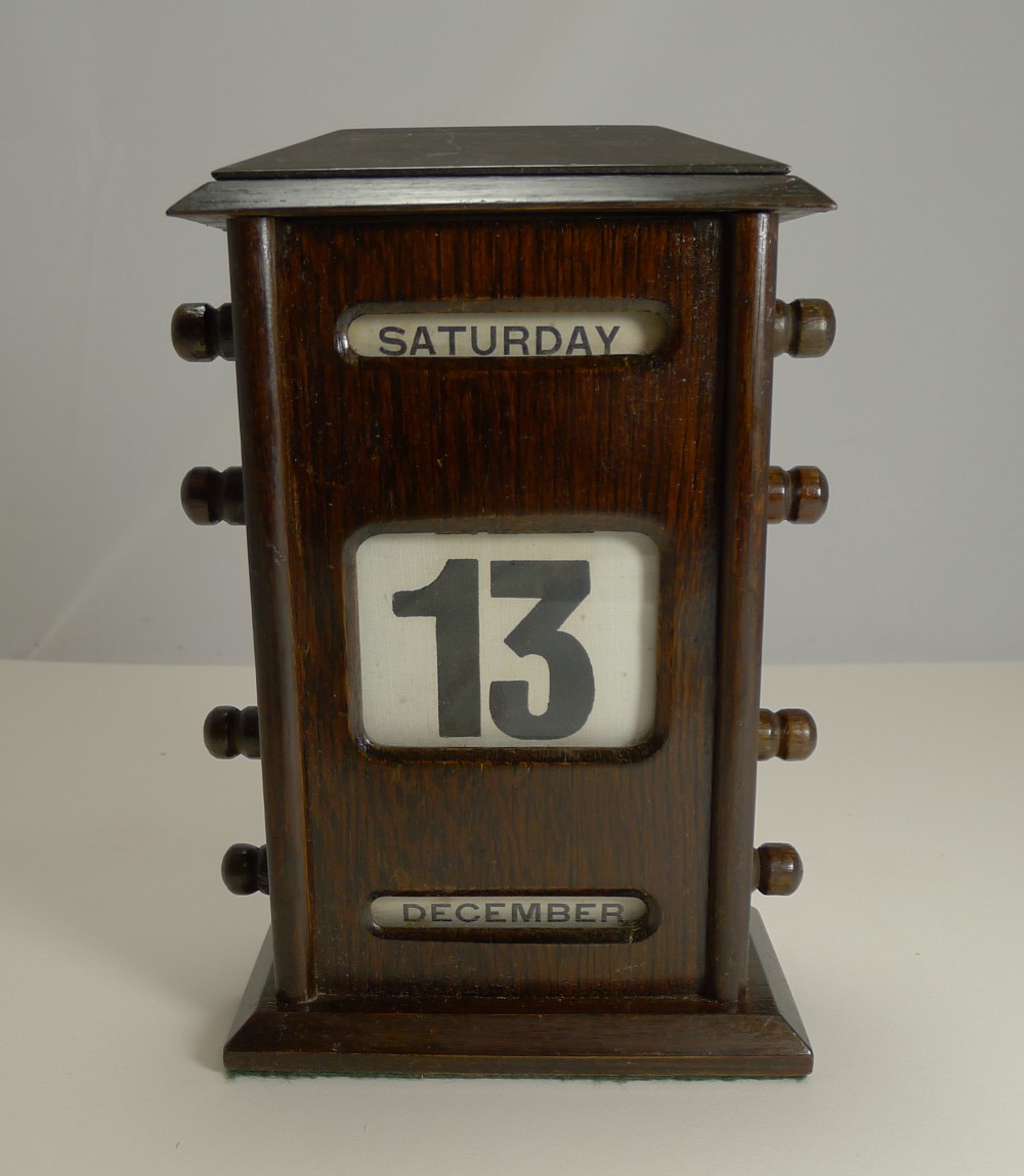 antique english oak perpetual desk calendar c1900 signed by retailer
