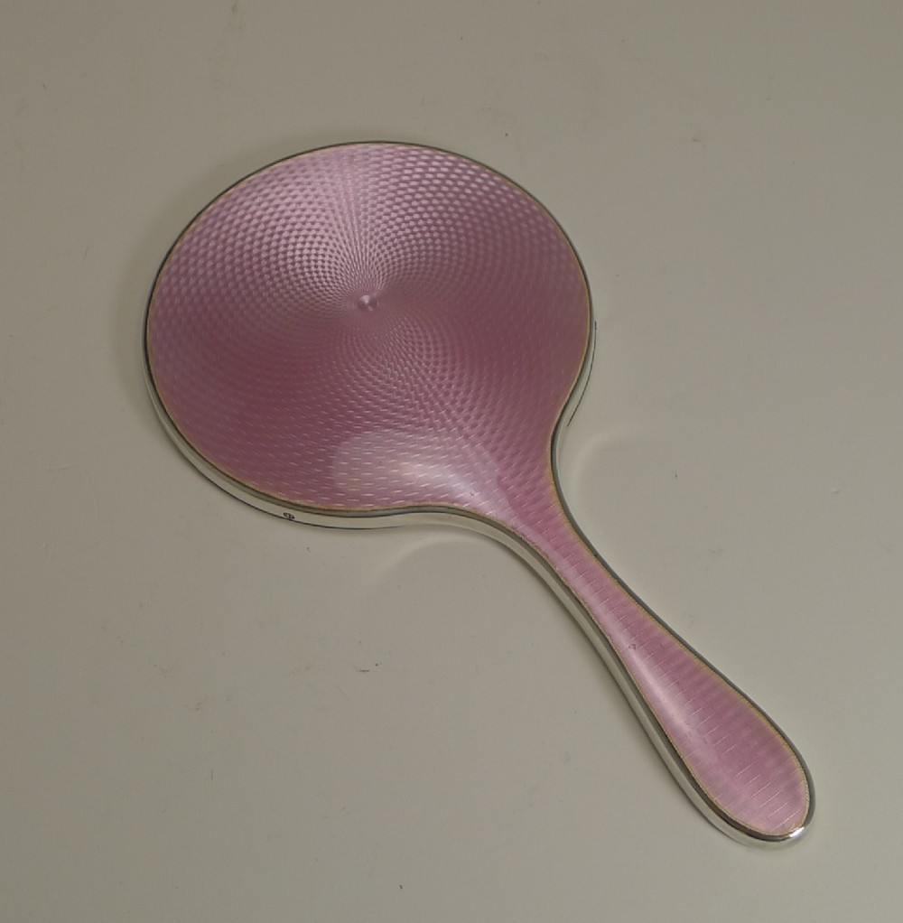 pretty pink guilloche enamel and english sterling silver hand mirror 1928