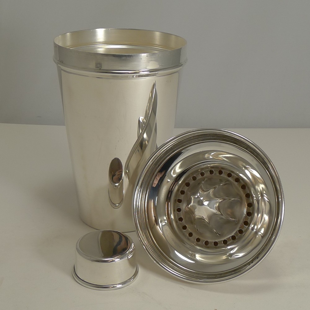 large vintage silver plated cocktail shaker with integral lemon squeezer farquharson