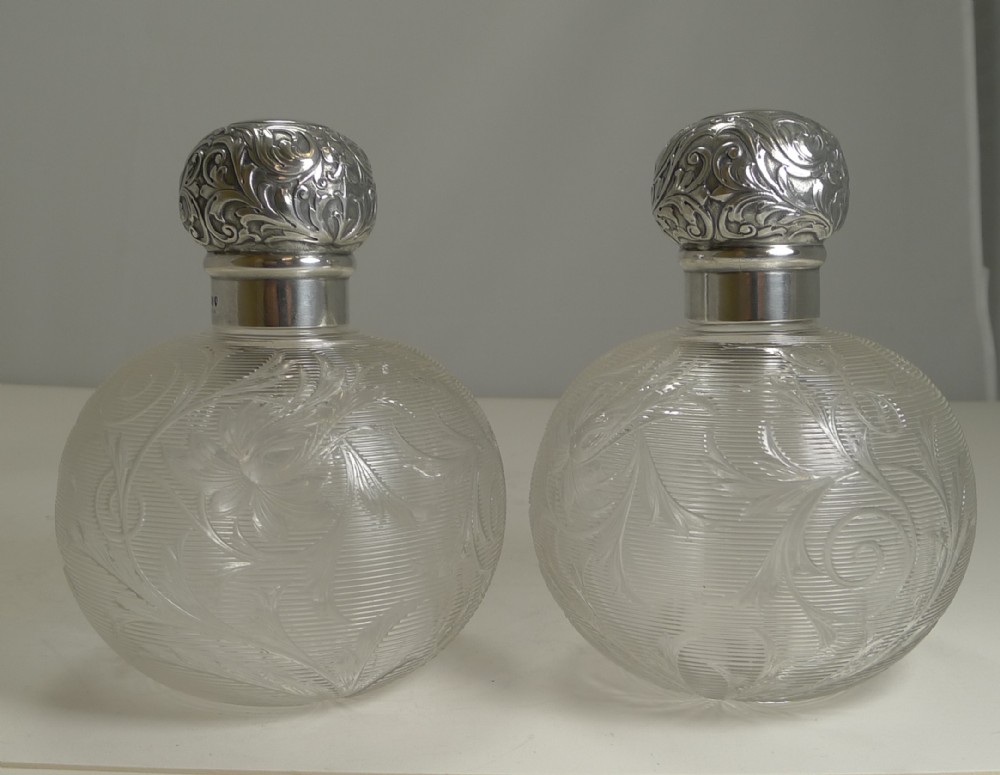 finest pair antique english silver topped perfume bottles by asprey london
