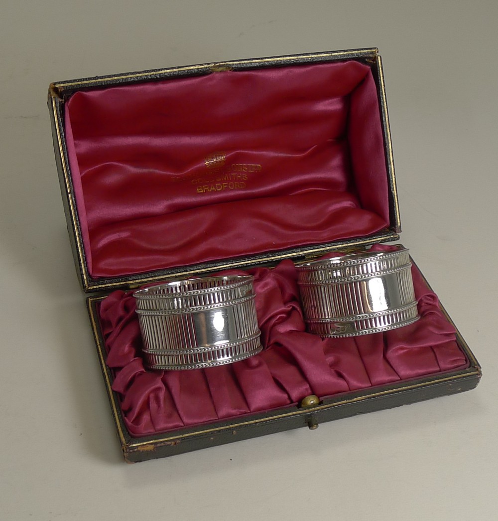 unusual smart pair antique english sterling silver napkin rings 1902