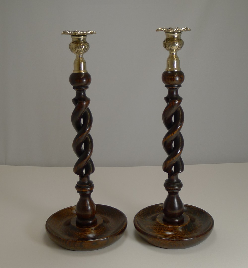 pair 14 solid oak open barley twist candlesticks brass tops