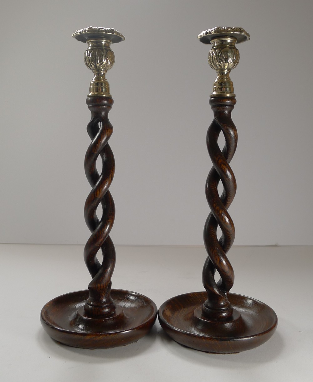 pair antique english oak open barley twist candlesticks c1910
