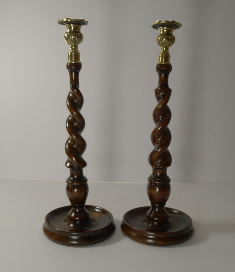 pair antique english oak and brass barley twist candlesticks c1900