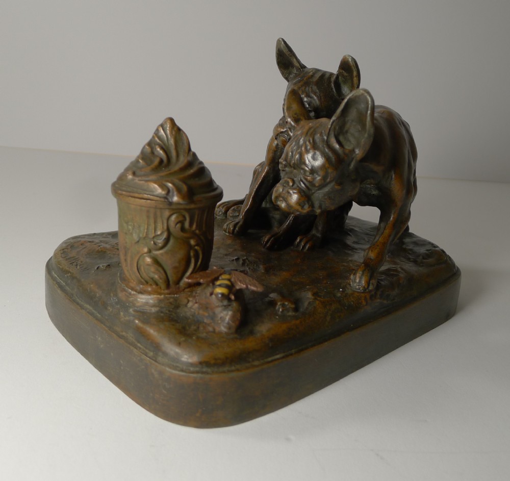 french bulldogs chasing a bee inkwell by e samson c1940