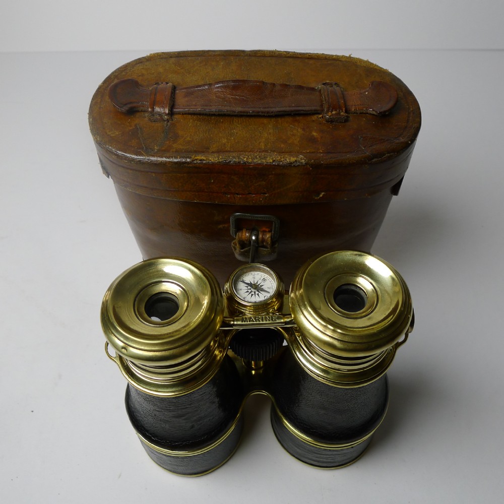rare antique triple lens binoculars with compass