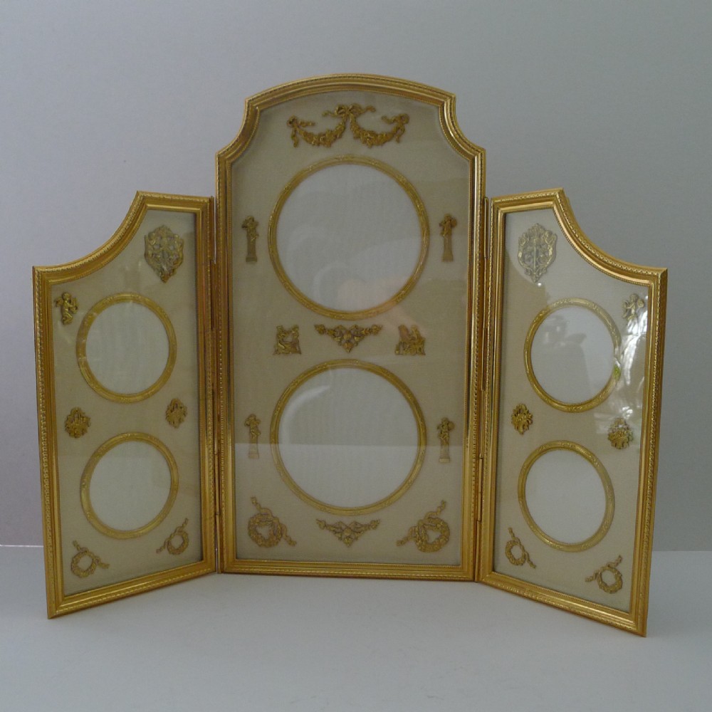 magnificent french gilded bronze six aperture picture frame
